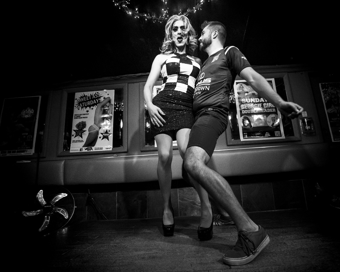 Muddy York Rugby Football Club's rookie player Kevan Hannah dances with Demanda Tension during the Beaver Bowl opening ceremony at Woody's on Friday September 2, 2016, in Toronto, Ontario. The 2016 Beaver Bowl edition featured three American teams and three Canadian ones. Muddy York Rfc will host the next edition of the tournament in Montreal, to help the local inclusive team, the Armada, to develop its brand and audience.